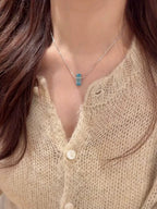 Velira Emerald Cut Blue D Necklace